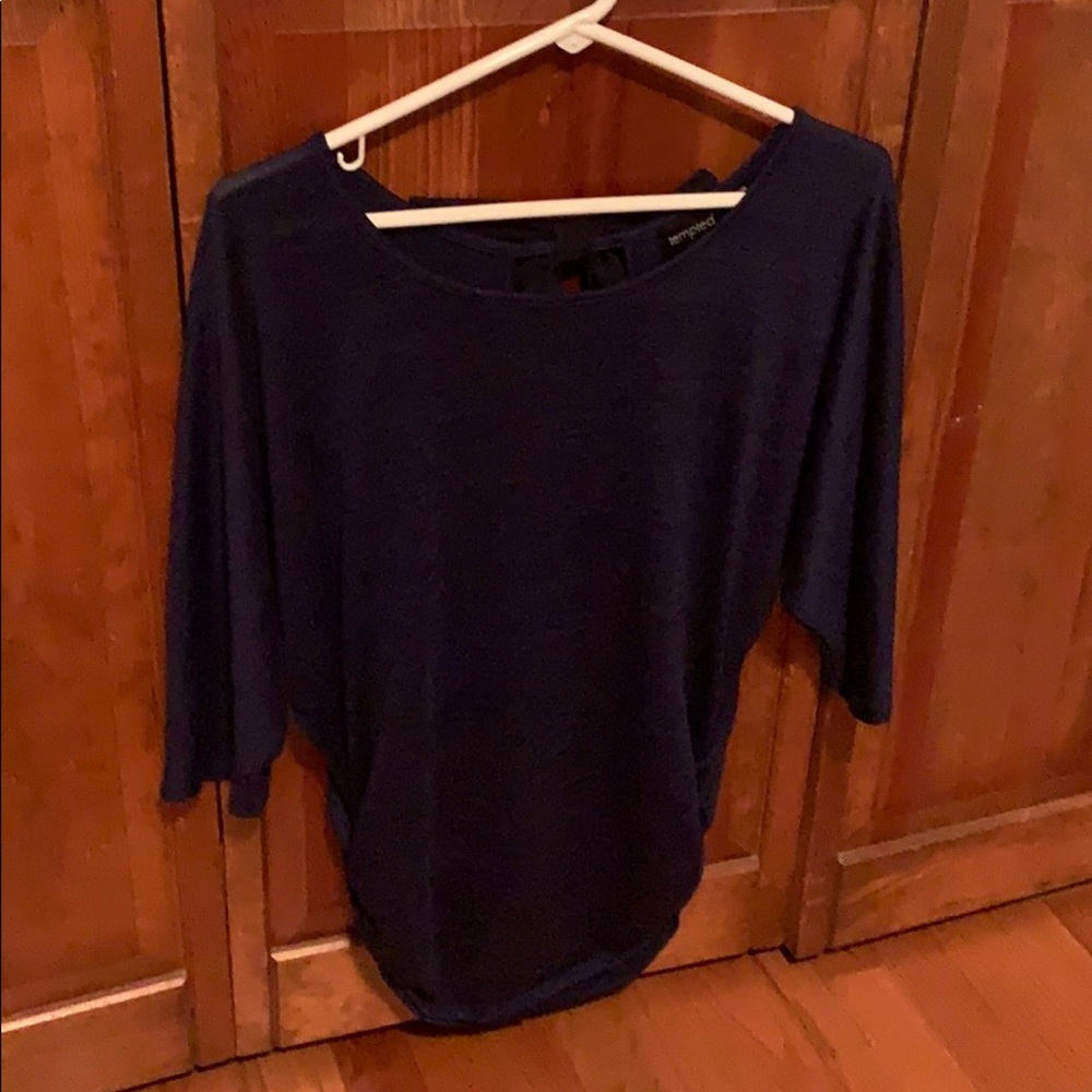 Blue short sleeve shirt with bow in back